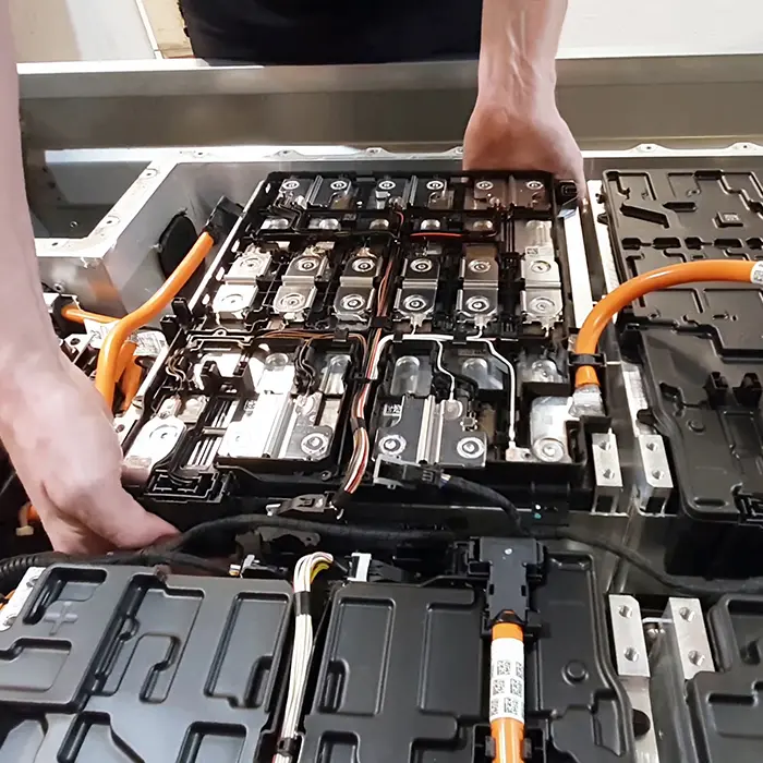 a person is working on a battery that
